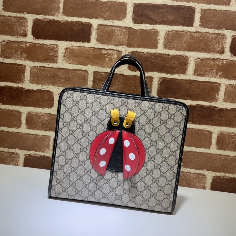 G*u*i shopping bags